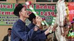 Semangat Ibu-ibu Ramaikan Festival Pukul Bedug di Jakut