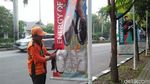 Foto: Before-After Coretan Banner Asian Games yang Dibersihkan