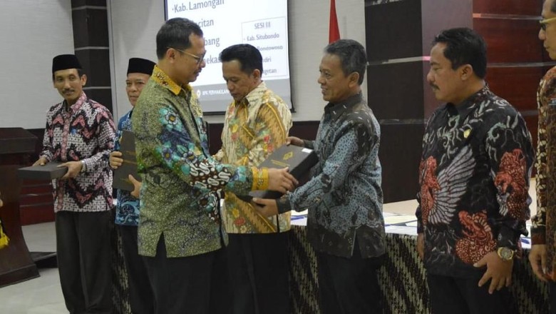 Opini WTP versus Korupsi Opini WTP versus Korupsi