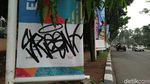 Foto: Before-After Coretan Banner Asian Games yang Dibersihkan