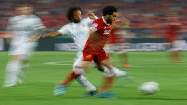 Mohamed Salah sempat merepotkan pertahanan Real Madrid di awal laga final Liga Champions.