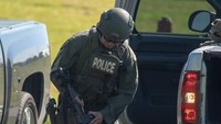 Polisi telah mengamankan pelaku penembakan itu. Namun identitasnya belum diungkap. Foto: Kevin Moloney/AFP