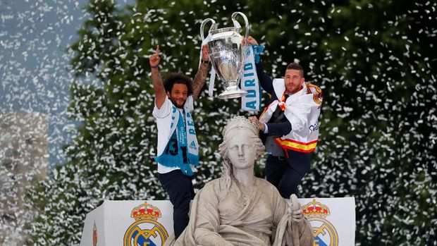 Real Madrid meraih trofi Liga Champions untuk kali ketiga secara beruntun usai mengalahkan Liverpool 3-1 di laga final. (