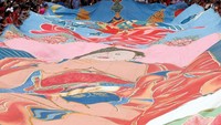 Penampakan thangka yang dibentangkan di Kuil Buddha Tibet (Foto: Dok. REUTERS/Lai Seng Sin)