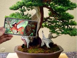 Kreatif! Gambar dalam Ponsel Bersatu dengan Dunia Nyata