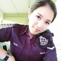 Oli Lee merupakan polisi wanita yang ditempatkan di markas polisi yang terletak di Kuala Lumpur.Foto: Dok. Facebook/Oli Lee
