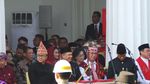 Gaya Jokowi Berbaju Adat Jawa Pimpin Upacara Hari Lahir Pancasila