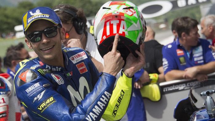 Valentino Rossi optimistis menyambut MotoGP Catalunya (Foto: Mirco Lazzari gp/Getty Images) Valentino Rossi optimistis menyambut MotoGP Catalunya (Foto: Mirco Lazzari gp/Getty Images)