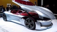 Renault Trezor merupakan mobil dengan coupe elektrik dua tempat duduk yang memanfaatkan kanopi pengangkatan bukan dari pintu. Mobil ini dilengkapi dengan tiga mode berkendara netral, sport dan self-drive, serta dash yang dioperasikan dengan sentuhan yang dapat disesuaikan. Veli Gurgah/Anadolu Agency/Getty Images.
