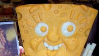 Bagi penggemar keju sekaligus tokoh kartun Sponge Bob pasti senang melihat karya yang satu ini. Kejunya dibuat lucu dengan mata dan mulut Sponge Bob. Foto: Istimewa