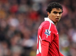 Nah, yang ini saudara kembar Rafael, Fabio Da Silva. Dia memperkuat MU selama lima musim pada 2009/2014. (Foto: Dean Mouhtaropoulos/Getty Images)