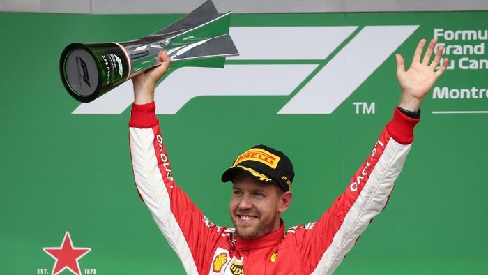 Sebastian Vettel tampil sebagai pemenang di GP Kanada 2018 (Foto: Carlo Allegri/Reuters) Sebastian Vettel tampil sebagai pemenang di GP Kanada 2018 (Foto: Carlo Allegri/Reuters)