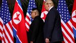 Detik-detik Pertemuan Bersejarah Trump-Kim yang Berlangsung Hangat