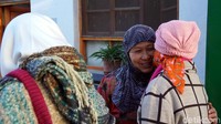 Kami disambut dengan ramah oleh sang pemilik rumah. Meski terkendala bahasa, tetapi kami seperti sudah lama akrab. (Wahyu/detikTravel)