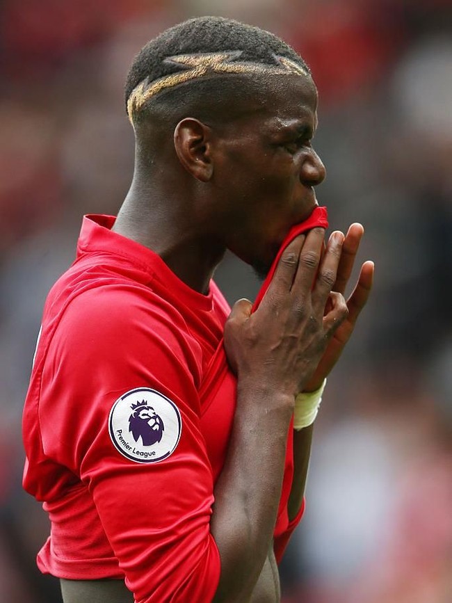 Rambut cepak dengan ukiran-ukiran unik sudah menjadi gaya khas Paul Pogba. (Foto: Getty Images)
