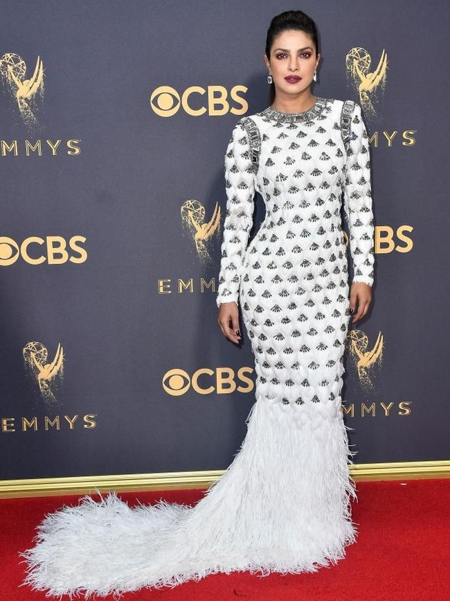 Priyanka Chopra punya nama julukan yang manis. Seperti dilansir Cosmopolitan, wanita berbibir seksi itu kerap dipanggil teman dan keluarganya dengan Sunshine atau Mimi. (Foto: Getty Images)