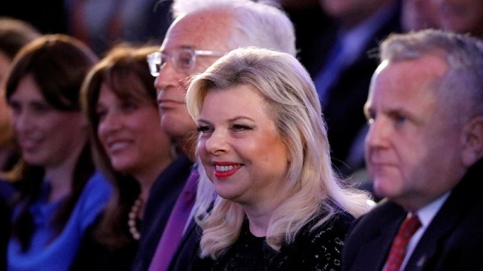 FILE PHOTO: U.S. Deputy Secretary of State John Sullivan, Israeli Prime Minister Benjamin Netanyahus wife Sara Netanyahu and U.S. Ambassador to Israel David Friedman sit during a reception held at the Israeli Ministry of Foreign Affairs in Jerusalem, ahead of the moving of the U.S. embassy to Jerusalem, May 13, 2018. REUTERS/Amir Cohen/File Photo