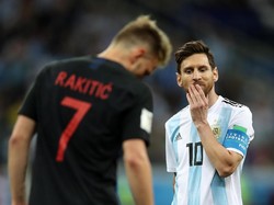Nasib Messi bertolak belakang dengan rekannya di Barcelona, Ivan Rakitic. Rakitic bisa bernapas lega karena Kroasia sudah lolos ke 16 besar. Foto: Clive Brunskill/Getty Images