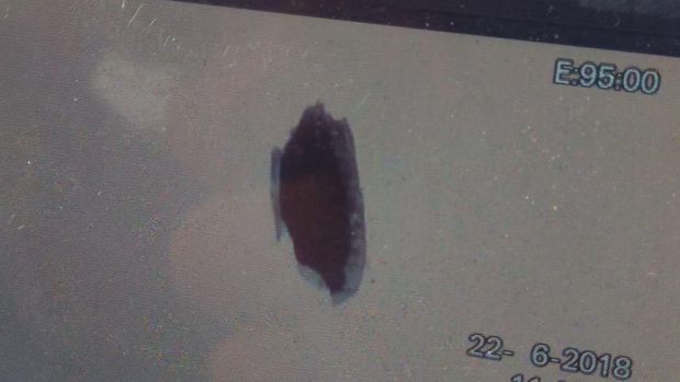Penampakan lubang di tembok gedung tahanan yang dijebol
