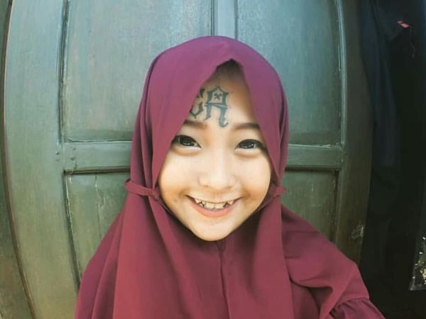 Foto: Gaya Hijab Mantan Anak Punk yang Punya Tato di Wajah