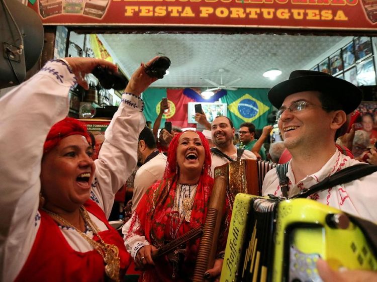 Suporter Portugal dan Spanyol Pesta Kelolosan, Iran dan Maroko berduka