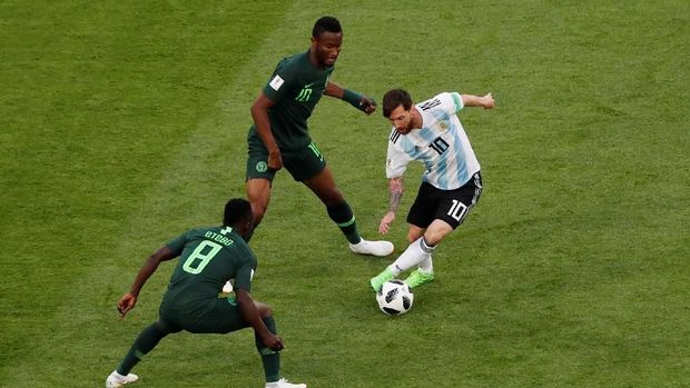   Lionel Messi is often guarded by several players at once. 