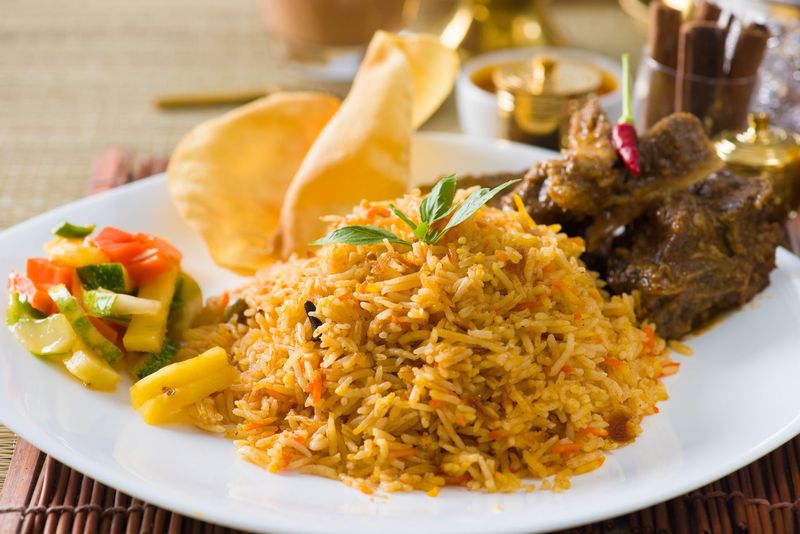 Indian Food Entree of Tandoori Chicken with Herbs on top