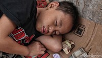 Bocah ini diduga pengemis.