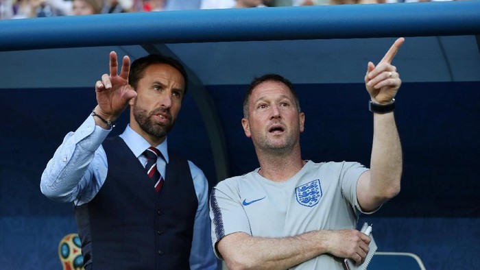 Soccer Football - World Cup - Group G - England vs Belgium - Kaliningrad Stadium, Kaliningrad, Russia - June 28, 2018   England manager Gareth Southgate and assistant manager Steve Holland after the match   REUTERS/Lee Smith