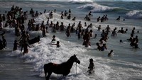Terlihat seperti tempat liburan pada umumnya. Foto: Mohammed Salem/Reuters