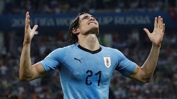 Edinson Cavani mencetak gol kemenangan Uruguay ke gawang Portugal di 16 Besar Piala Dunia 2018. 