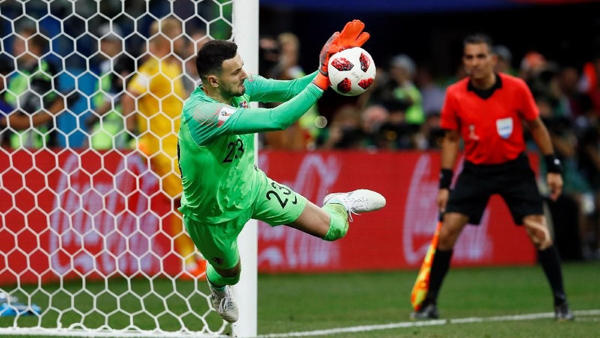 Danijel Subasic menepis tiga penalti pemain Denmark. (Foto: Jason Cairnduff/Reuters)