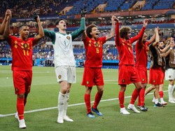 Para pemain Belgia merayakan kemengan mereka. REUTERS/Toru Hanai.