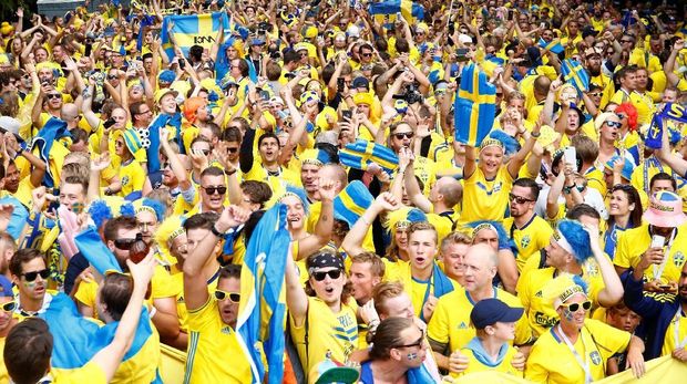   Swedish fans celebrate victory over Switzerland in the knockout stage of the 2018 World Cup. 