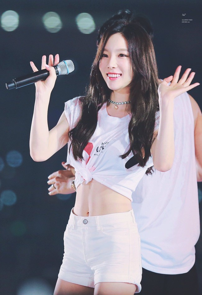 Memiliki bentuk tubuh paling mungil diantara member SNSD lainnya, Taeyeon tetap terlihat menawan dan memesona dengan abs yang dimilikinya. Foto: Ist.