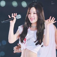 Memiliki bentuk tubuh paling mungil diantara member SNSD lainnya, Taeyeon tetap terlihat menawan dan memesona dengan abs yang dimilikinya. Foto: Ist.