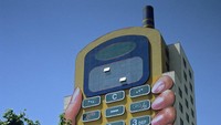 China kembali memperlihatkan gedung uniknya. Kali ini berbentuk telephone seluler yang berada di Yunnan Selatan. Istimewa/David Myers Photography.