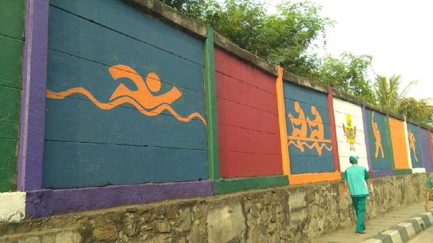 Mural Asian Games di tembok di kawasan Ancol, Jakut