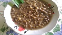 @kartsiregar menikmati bubur kacang hijau yang kental tanpa santan dan paduan lainnya.  Foto: Instagram @kartsiregar