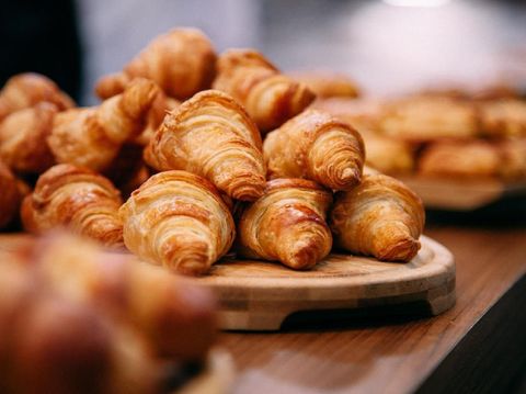 Crepes with Chocolate Sauce, Powdered Sugar, Nuts and Fresh Berries