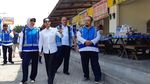 Berkacamata Hitam, Rini Tinjau UMKM di Rest Area Tol