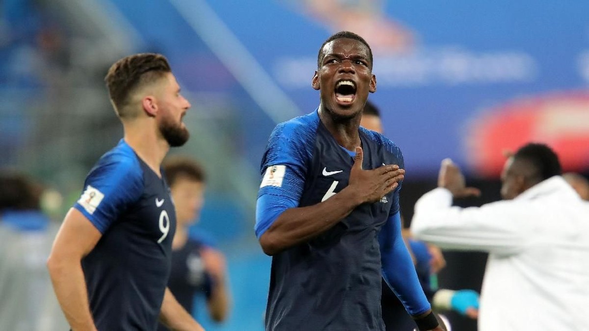 Aksi Paul Pogba (kanan) di Timnas Prancis. (Foto: Alexander Hassenstein/Getty Images)