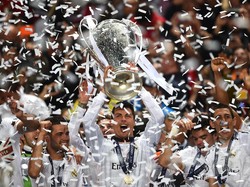 Butuh waktu bagi Ronaldo untuk meraih titel Liga Champions pertamanya bareng Madrid, yakni di 2014. Gelar ini terasa lebih istimewa untuknya karena diraih di tanah kelahirannya, Portugal. (Foto: Laurence Griffiths/Getty Images)
