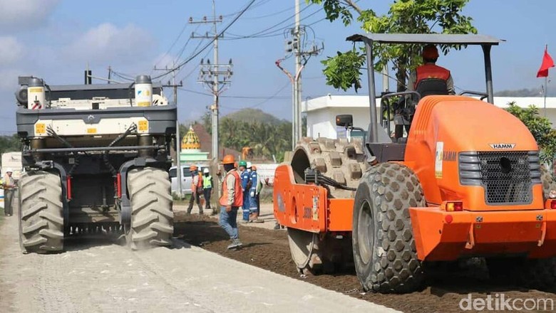 Perbaikan Jalan Menuju Pulau Merah Hampir Rampung Perbaikan Jalan Menuju Pulau Merah Hampir Rampung