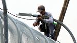 Sudin Perindustrian dan Energi Perbaharui Lampu JPO Gatot Subroto