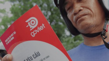 Calon driver melihat persyaratan untuk menjadi mitra Go-Viet dengan seksama. Foto: istimewa