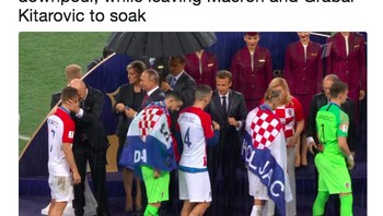 Putin memperdaya lagi pemimpin dunia lain dengan membawa payung dan membiarkan Macron serta Grabar Kitarovic basah kuyup Foto: istimewa