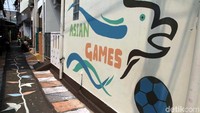 Mural Asian Games ini pun membuat perkampungan di Jakarta ini terlihat lebih cerah dan berwarna sehingga mengurangi kesan kumuh dan tidak terawat.