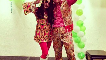 Tan bersama sang istri saat berada di kantor Grab Indonesia dengan gaya pakaian yang unik. (Foto: Instagram)