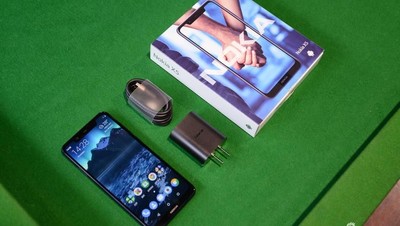 Penampakan Jeroan Nokia X5 Ketika Dipreteli